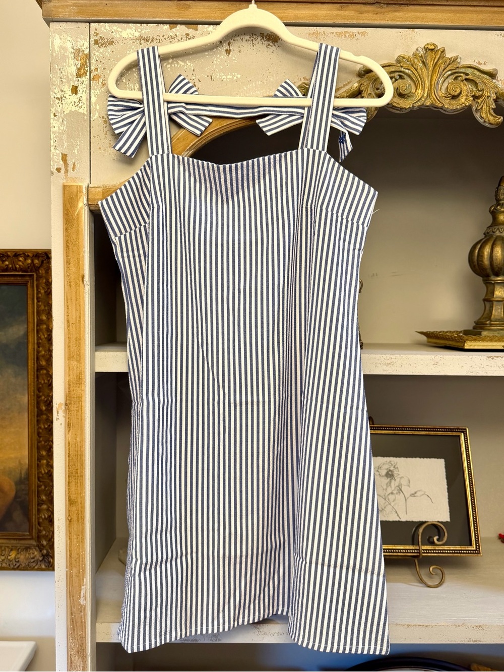 The Nea by Henry Duvall 
Navy & White Striped Sundress with Bow Tie Straps